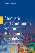 Atomistic and Continuum Fracture Mechanics of Solids: An Integrated Treatment