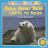 Baby Polar Bear Learns to Swim