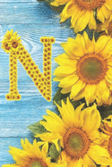 N: Sunflower Personalized Initial Letter N Monogram Blank Lined Notebook, Journal and Diary with a Rustic Blue Wood Background
